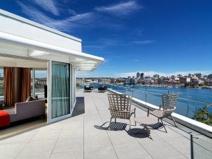 arsens suite patio with chairs looking out to the harbour