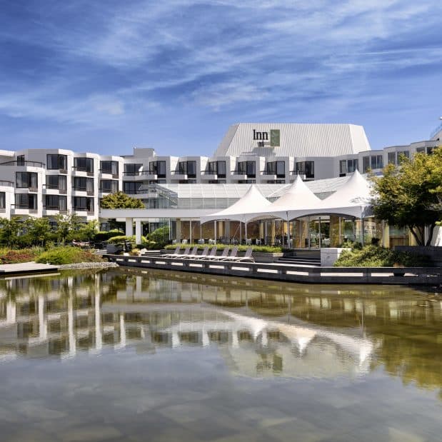 Exterior Shot of Inn at Laurel Point with Reflecting Pool