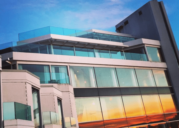 exterior of Inn at Laurel Point Erickson Wing at sunset