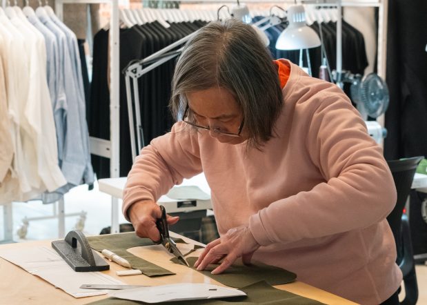 clothes being worked on in Ecologyst, a Key to the City Partner