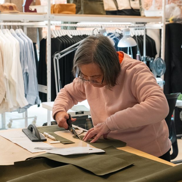 clothes being worked on in Ecologyst, a Key to the City Partner