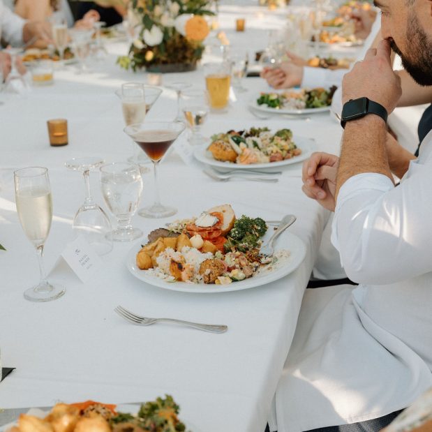 guests enjoying dinner at a wedding, Picture Credit: Ameris Photography