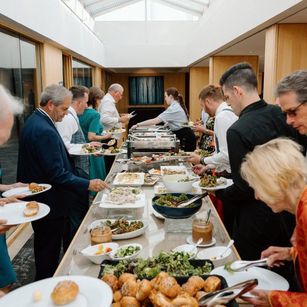 wedding guests at a buffet, Picture Credit: Ameris Photography