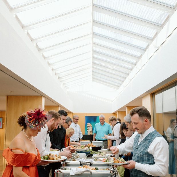 wedding guests at a buffet, Picture Credit: Ameris Photography