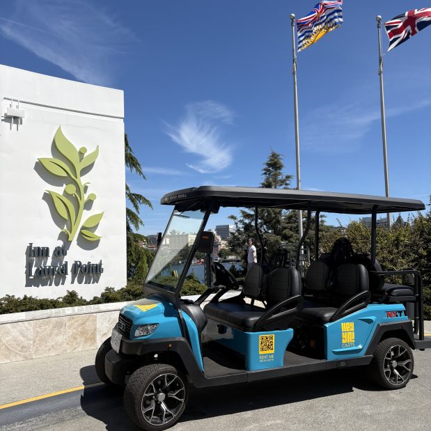 HeyYa electric golf cart parked in the driveway of Inn at Laurel Point
