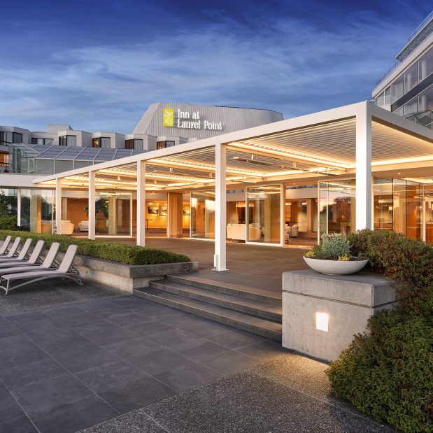 Inn at Laurel Point Terrace Patio lit up in the evening